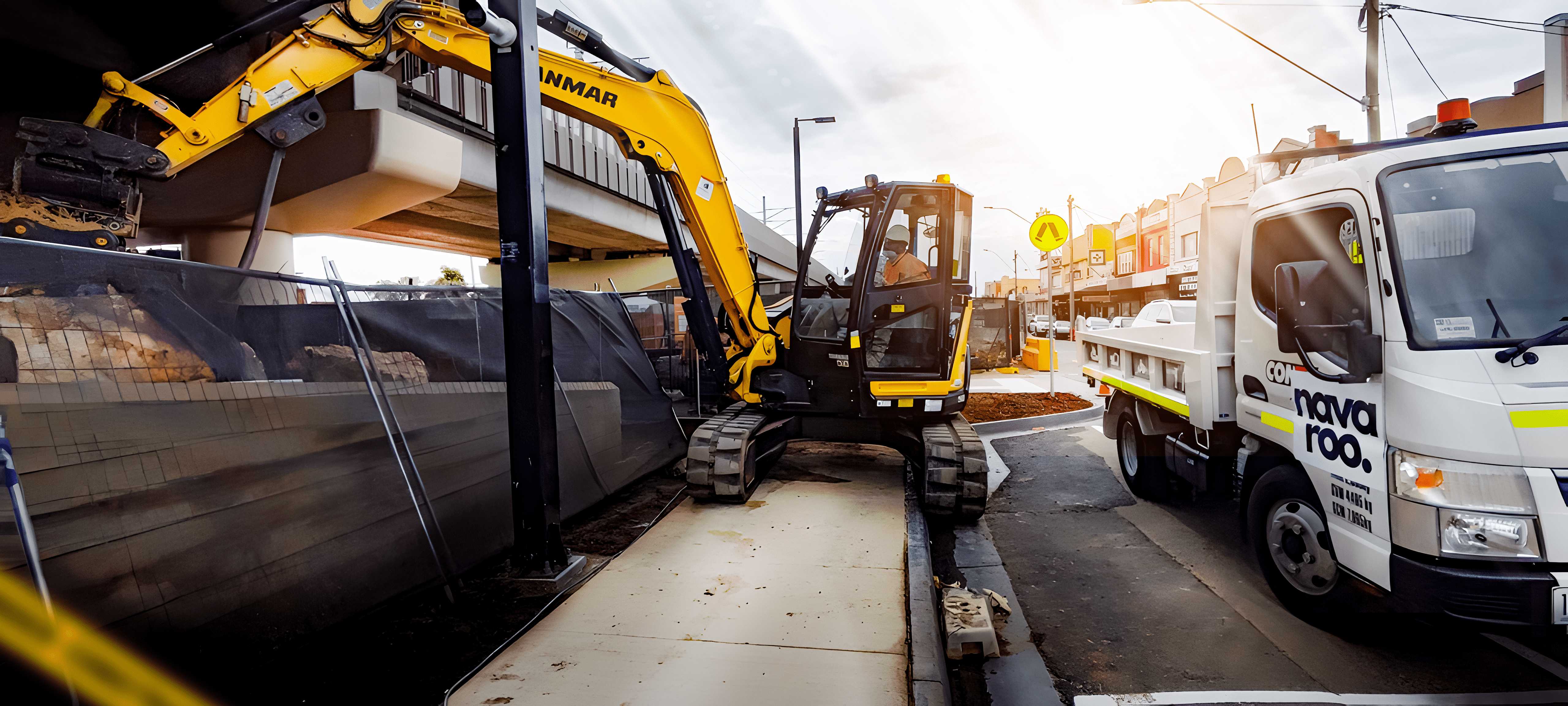 Excavator and truck